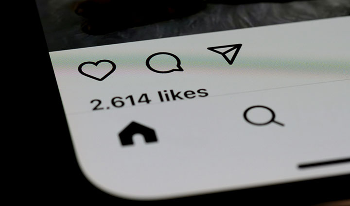 Imagen de una app social donde se muestran los likes de una publicación y el menú. Foto de Brett Jordan en Unsplash